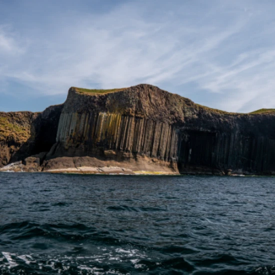 a rocky island on the water