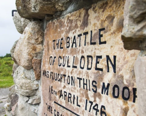 Stone memorial marking the site of the Battle of Culloden, fought on April 16, 1746, with engraved text.
